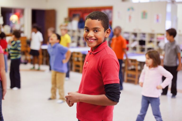 Children dancing in classroom